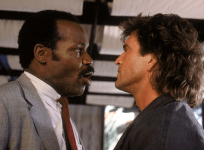 Danny Glover and Mel Gibson as Roger Murtaugh and Martin Riggs