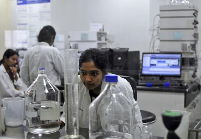 Scientists working at Biocon, Bengaluru. biocon, biocon q4 results, biocon share price, biocon bonus issue, kiran mazumdar shaw