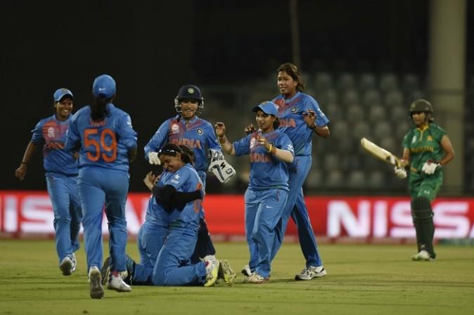 Pictured: Indian women cricketers celebrate fall of a wicket during the ICC Women`s World T20 match between India and Pakistan at Feroz Shah Kotla in New Delhi on March 19, 2016. India Women