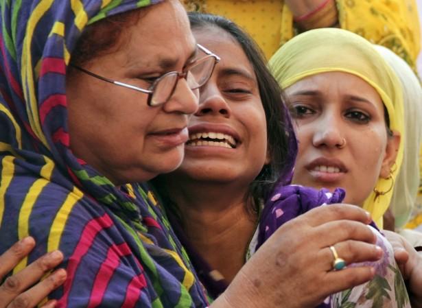 The grieving family of the 52-year Mohammed Akhlaq who was killed in the Dadri lynching. Dadri lynching