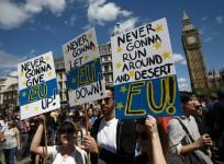 Demonstrators march through London, protesting against Brexit