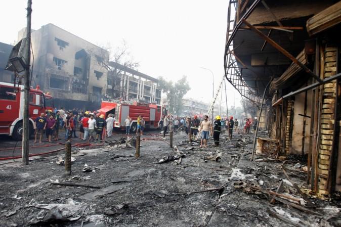 [Representational Image' People inspect the site of a suicide car bomb in the Karrada shopping area, in Baghdad, Iraq July 3, 2016.
