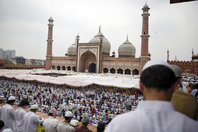 When is Eid al-Fitr and how is it celebrated by Muslims?