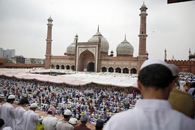 When is Eid al-Fitr and how is it celebrated by Muslims?
