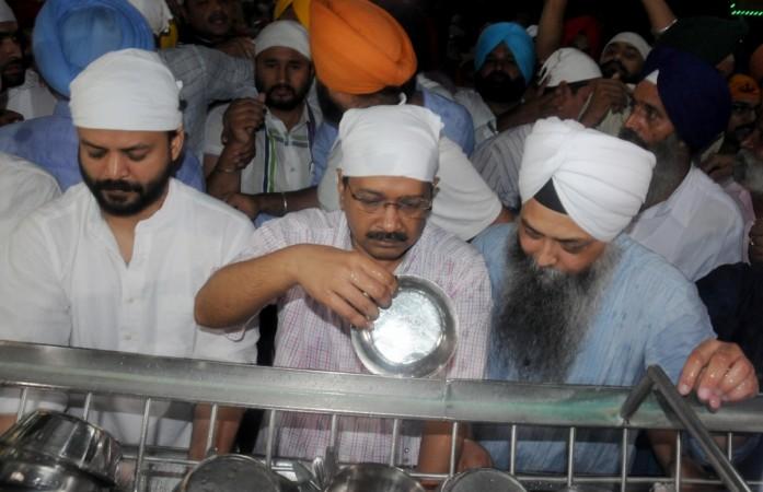 arvind kejriwal punjab aap elections assembly 2017 golden temple ad hurt religious sentiments penance utensils