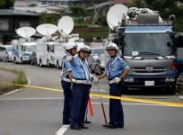 Police officers stand guard at a facility for the disabled, where a deadly attack by a knife-wielding man took place, in Sagamihara, Kanagawa prefecture, Japan, July 26, 2016.
