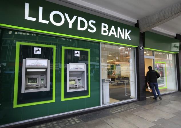 lloyds banking group job cut net profit branches shut down