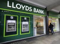 lloyds banking group job cut net profit branches shut down