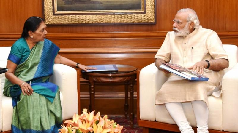 Anandiben Patel says by adopting poor kids in MP, Modi's dream for 2022 will be fulfilled. Gujarat Chief Minister Anandiben Patel calls on Prime Minister Narendra Modi in New Delhi, on May 16, 2016.