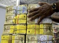 aap mla raid income tax cash seizure recovery aap bjp clash recovery unaccounted wealth black money