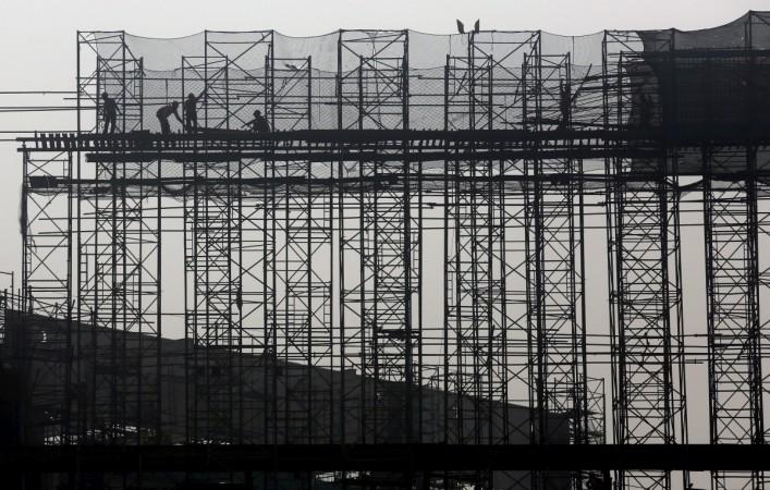 real estate construction bill workers prestige estates bangalore demolition illegal encroachment restructuring business share price developer