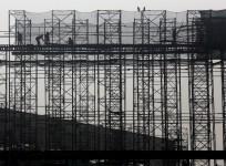 real estate construction bill workers prestige estates bangalore demolition illegal encroachment restructuring business share price developer