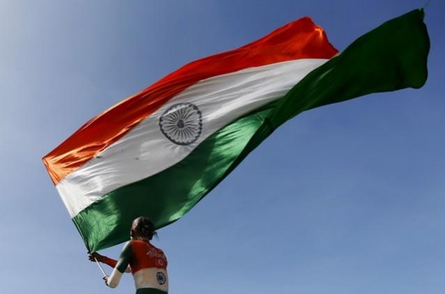 Indian flag. Bollywood celebs wish Happy Independence Day. Pictured: A person with the Indian flag in his hand.