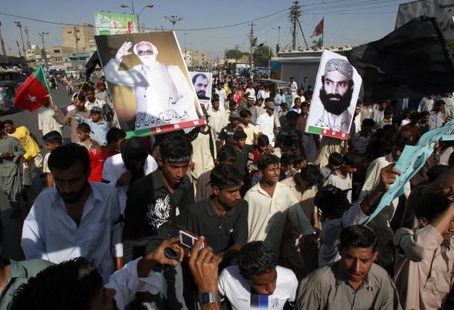 Supporters of Baluchistan National Party (BNP) protest during a rally in Karachi April 12, 2009. The protesters demonstrated against what they said was the killing of political activists in Balochistan. Baluchistan National Party (BNP) rally in Karachi April 12, 2009