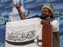 Hafiz Saeed, head of the Jamaat-ud-Dawa organisation and founder of Lashkar-e-Taiba (LeT), gestures while addressing his supporters in Karachi, Jan. 25, 2015.
