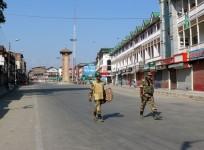 Soldiers deployed on Srinagar road as curfew continues for the 36th consecutive day in Kashmir on Aug. 13, 2016.