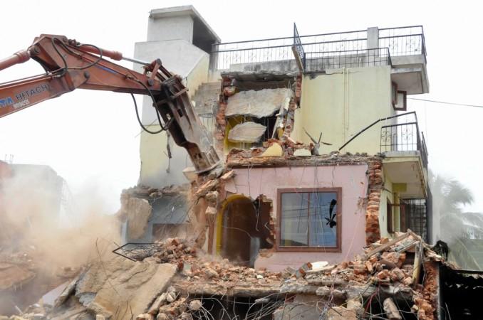 demolition bbmp bangalore bengaluru tech parks malls ramesh officials bda bbmp bmtf arrest congress bjp jds storm water drains swds floods rains