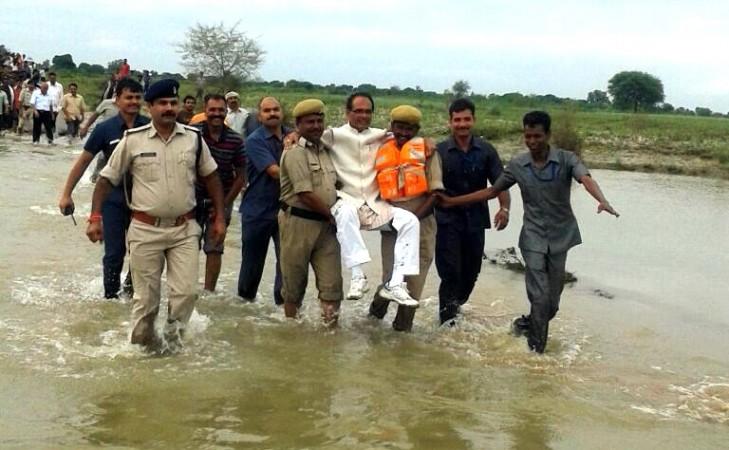 Madhya Pradesh Chief Minister Shivraj Singh Chouhan visits flood affected areas of the state on Aug. 21, 2016.