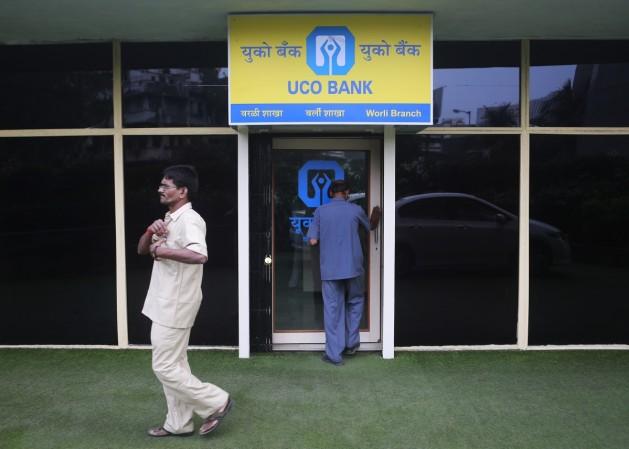 Nineteen commercial banks, including UCO Bank, will be filling about 19,000 clerical positions by way of an online common written examination in two parts, preliminary and main, according to a notification. In Picture: A customer enters a UCO bank branch as another walks past him, in Mumbai December 4, 2013 (representational image) bank jobs recruitment clerical thousands hiring employees scrapping of bsrb cwe test examination ibps cwe written common