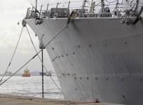 A U.S Navy officer runs next to the USS Nitze, a Guided Missile Destroyer in Rio de Janeiro on April 27, 2011.