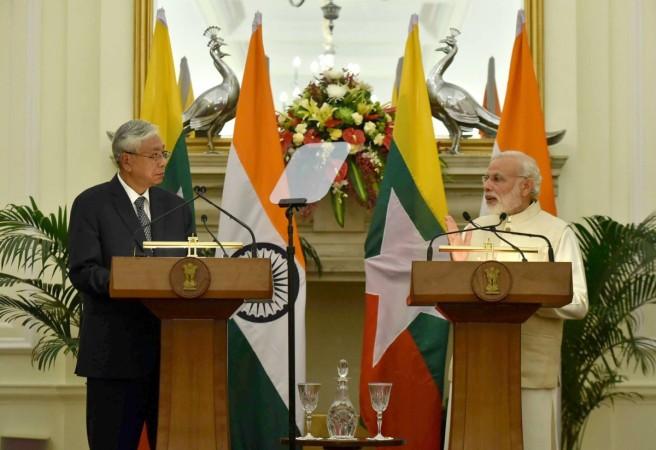 Prime Minister Narendra Modi with Myanmar President Htin Kyaw addresses a joint media briefing at Hyderabad House in New Delhi on Aug. 29, 2016.