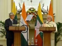 Prime Minister Narendra Modi with Myanmar President Htin Kyaw addresses a joint media briefing at Hyderabad House in New Delhi on Aug. 29, 2016.