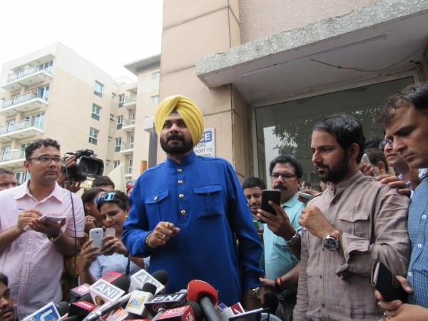Cricketer-turned-politician Navjot Singh Sidhu addresses a press conference in New Delhi on July 25, 2016