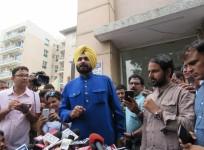 Cricketer-turned-politician Navjot Singh Sidhu addresses a press conference in New Delhi on July 25, 2016