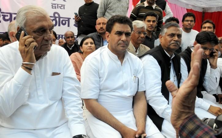Congress leaders including Bhupinder Singh Hooda sit on an indefinite fast to press for social harmony in Haryana, at Jantar Mantar in New Delhi on Feb. 21, 2016.