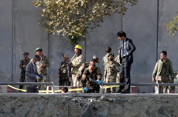 Afghan security forces inspect at the site of a suicide attack in Kabul, Afghanistan Sept. 5, 2016.