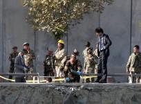 Afghan security forces inspect at the site of a suicide attack in Kabul, Afghanistan Sept. 5, 2016.