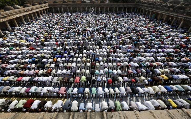 Muslims offer Eid al-Adha prayers at a mosque in Ahmedabad, India, Sept. 25, 2015.