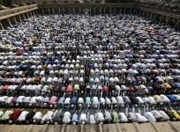 Muslims offer Eid al-Adha prayers at a mosque in Ahmedabad, India, Sept. 25, 2015.