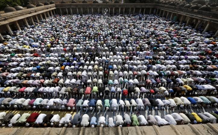Eid al Adha prayers Muslims offer Eid al-Adha prayers at a mosque in Ahmedabad, India, Sept. 25, 2015.