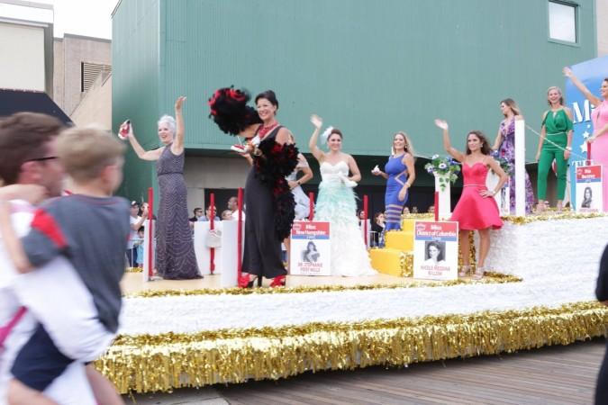 Parade float featuring Miss America winners from the past years
