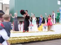 Parade float featuring Miss America winners from the past years