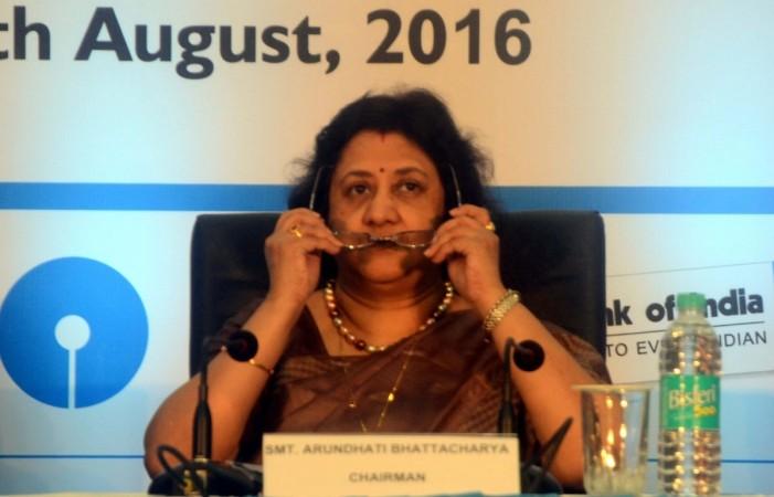 SBI Chairman Arundhati Bhattacharya sbi share price retail loans corporate loans npas lending rates interest consumers customers rbi cap corporate lending guidelines norms