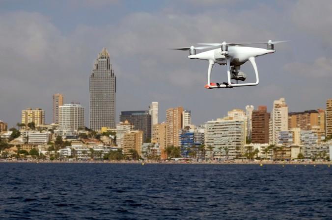 In Picture: A drone, equipped with a camera used by police for surveillance tasks, flies in front of Poniente beach at the eastern coastal town of Benidorm, Spain, Aug. 18, 2016. Dutch police train eagles to hunt drones