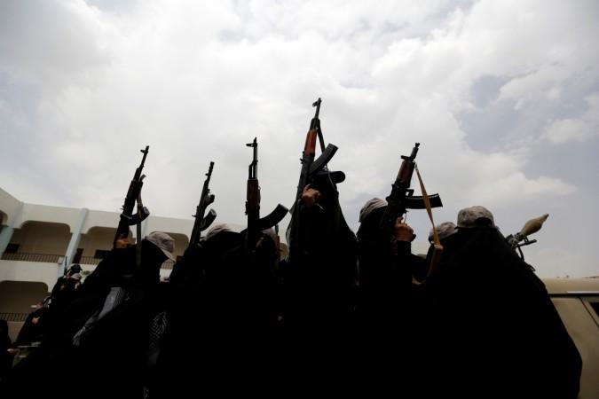 Women loyal to the Houthi movement carry rifles as they take part in a parade to show support to the movement in Sanaa, Yemen September 7, 2016. houthi women yemen