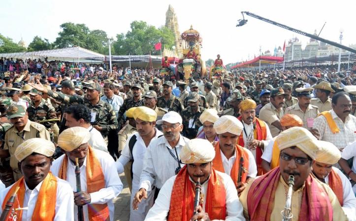 mysore dasara celebrations mysuru karnataka cauvery water dispute tourist arrivals tamil nadu bandh strike protest bus burning offers festival dussehra
