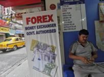 rupee devaluation dbs bank analyst rao radhika exports import rbi efforts stabilise fcnr fieo reports media competition weak global economy