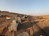 Military vehicles of the Kurdish Peshmerga forces are seen on the southeast of Mosul, Iraq, Aug. 14, 2016.