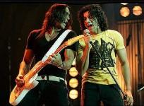 Farhan Akhtar does an Aerial act for Jaago song. Pictured: A still from Rock On.