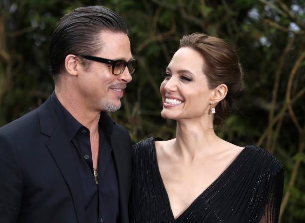 Actors Brad Pitt and Angelina Jolie arrive for a special Maleficent Costume Display at Kensington Palace in London May 8, 2014 Brad Pitt and Angelina Jolie in 2014