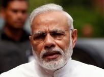 Prime Minister Narendra Modi speaks to the media inside the parliament premises