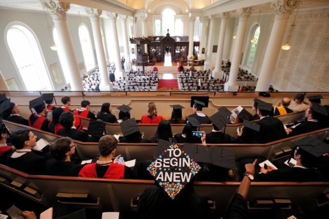 Students attend a service before the 365th Commencement Exercises at Harvard University in Cambridge, Massachusetts, U.S. Top universities