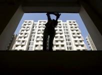 real estate construction bill workers prestige estates bangalore demolition illegal encroachment restructuring business share price developer pe investments fdi
