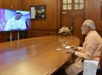 Prime Minister Narendra Modi interacts with Mata Amritanandamayi