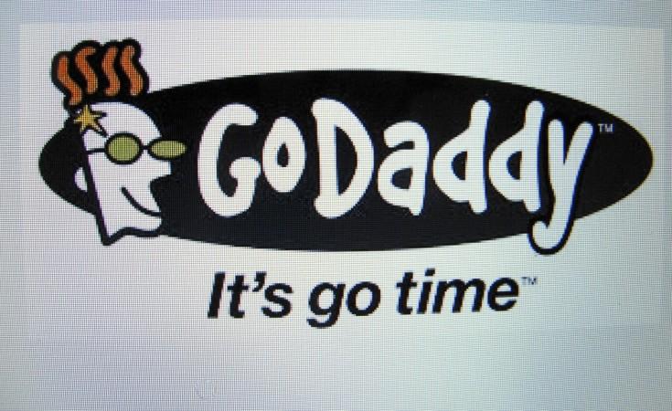 The GoDaddy inc. logo is shown on a computer screen