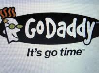 The GoDaddy inc. logo is shown on a computer screen